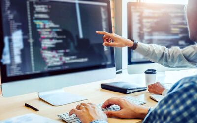 VitruviX developers conducting code testing and optimization
